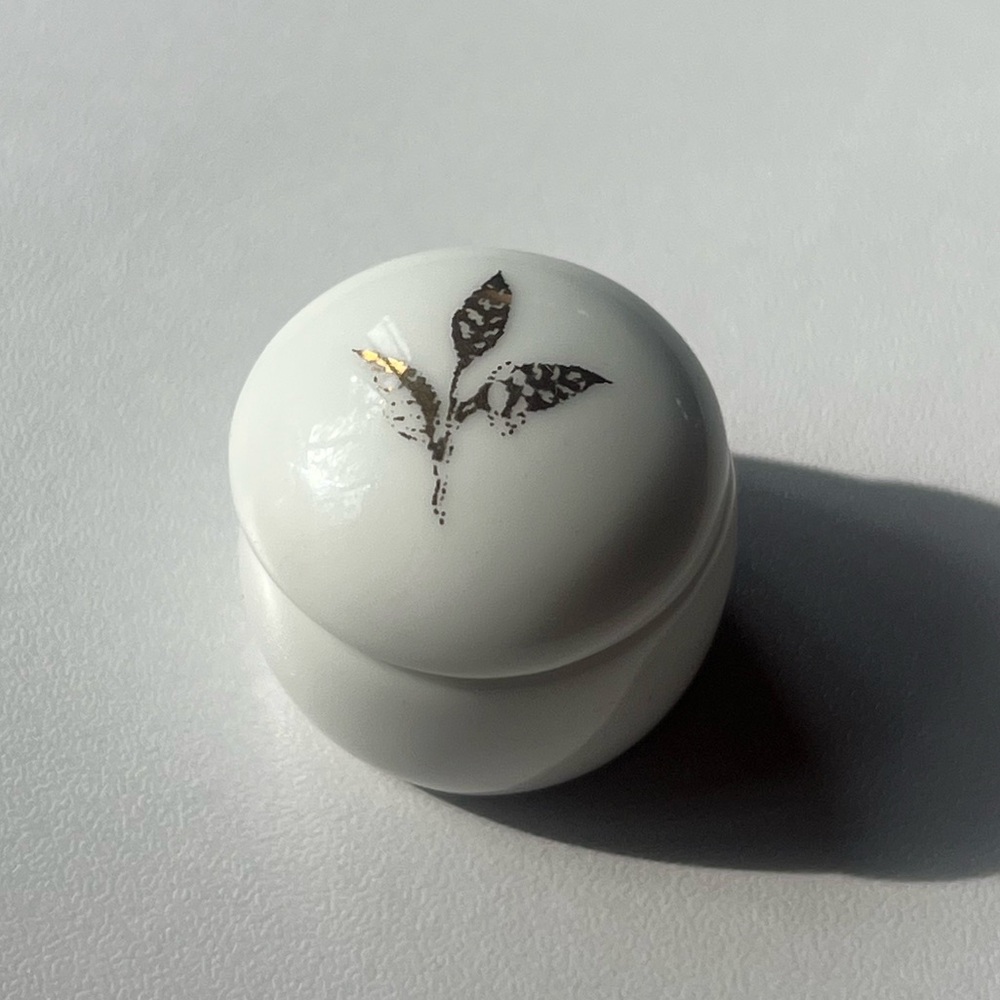 Tiniest White Porcelain Lidded Jar with Golden Leaf Motif and Inner Gold Design